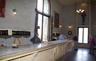 The high ceiling, stone walls, tapistries and coats of armor give one the feeling of tasting wines in a castle.